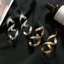 Simple and Fashion Personality Long Earrings Irregular Geometry Rotating Wave Eardrop with Zinc Alloy